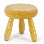 wooden stool with three legs